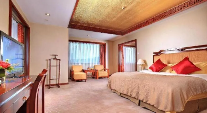 Bed in Xinhai Jinjiang Hotel