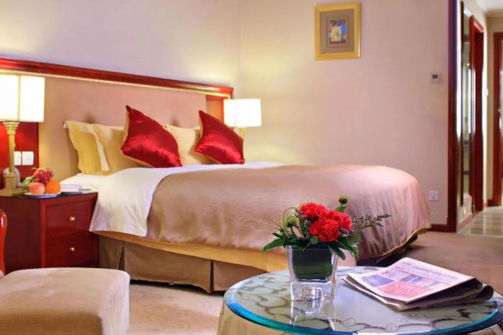 Bed in Xinhai Jinjiang Hotel