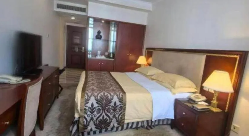 Bed in Xinhai Jinjiang Hotel