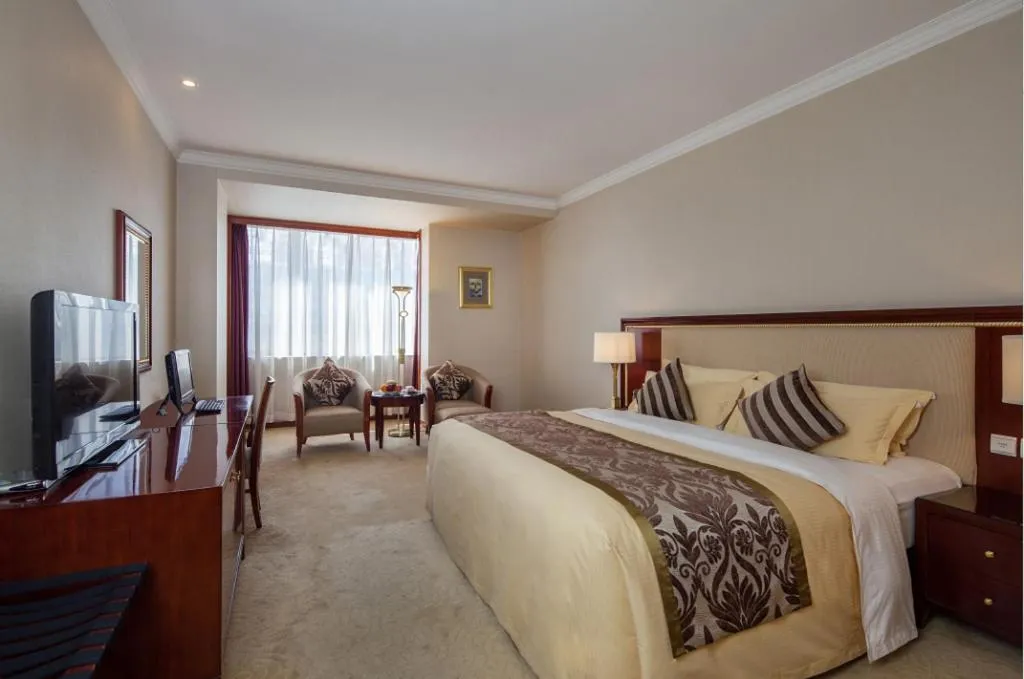 Bed in Xinhai Jinjiang Hotel