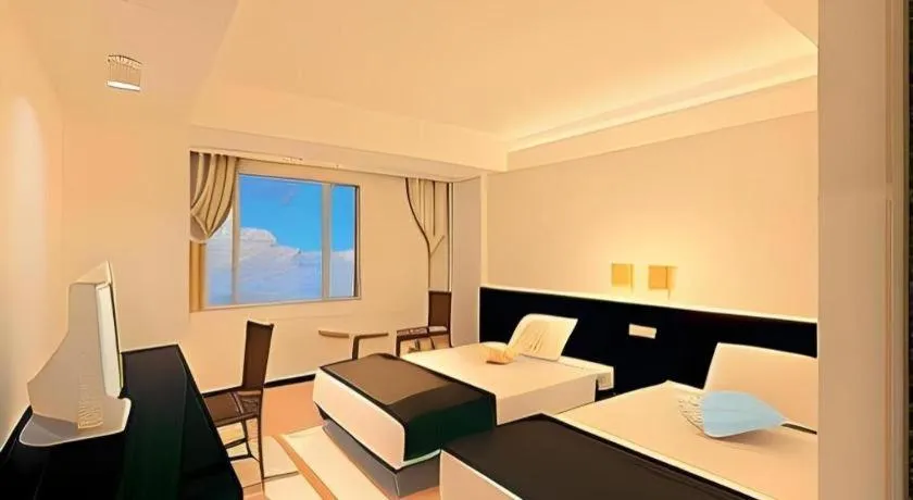 Bed in Hotel Gran View Okinawa