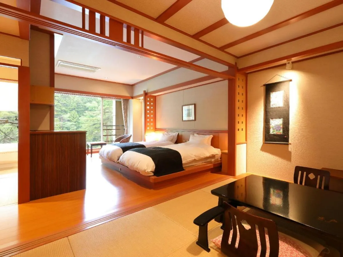 Photo of the whole room, Bed in Kinugawa Onsen Hana no Yado Matsuya