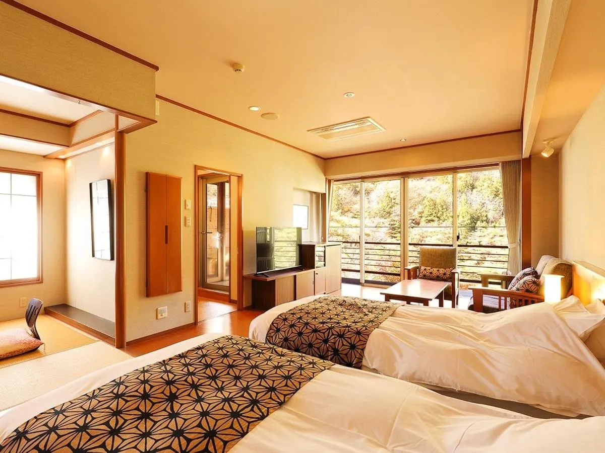 Photo of the whole room, Bed in Kinugawa Onsen Hana no Yado Matsuya
