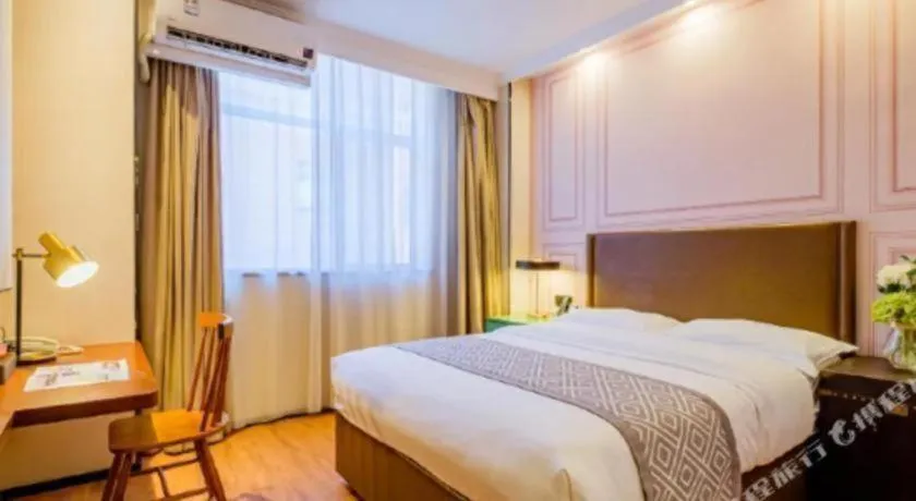 Bed in GME NanJing CaoChanGMEn Nanyihou Stress Hotel