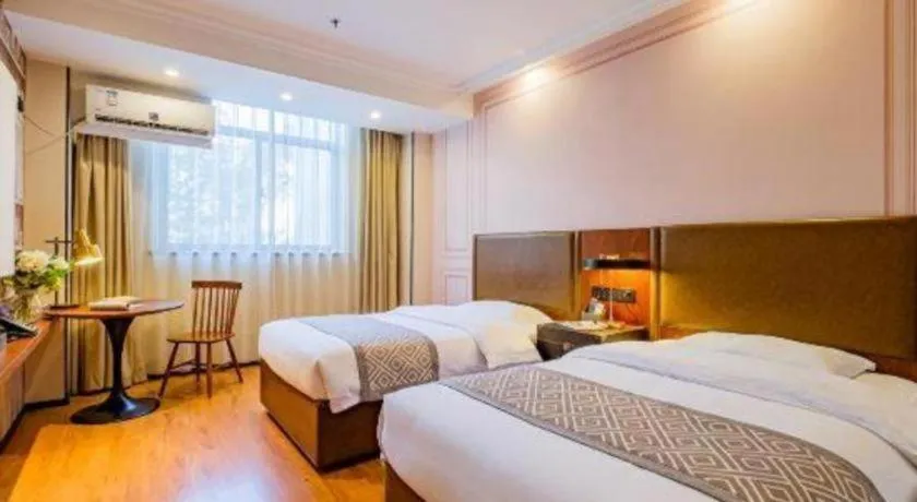 Bed in GME NanJing CaoChanGMEn Nanyihou Stress Hotel