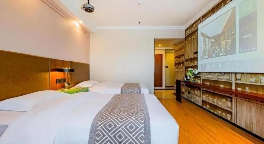 Bed in GME NanJing CaoChanGMEn Nanyihou Stress Hotel