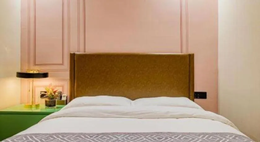 Bed in GME NanJing CaoChanGMEn Nanyihou Stress Hotel