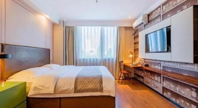 Bed in GME NanJing CaoChanGMEn Nanyihou Stress Hotel