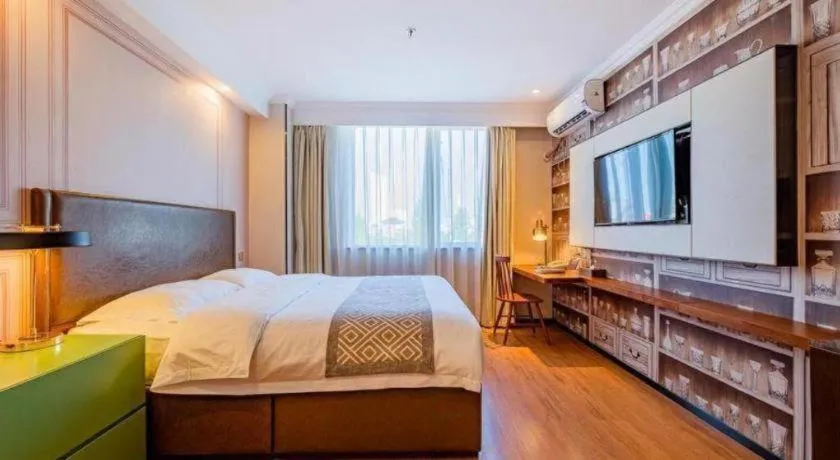 Bed in GME NanJing CaoChanGMEn Nanyihou Stress Hotel