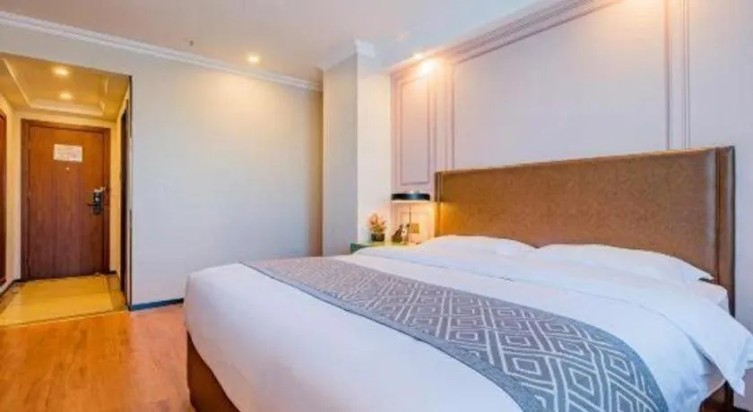 Bed in GME NanJing CaoChanGMEn Nanyihou Stress Hotel