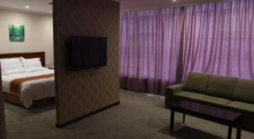 Bed in GME NanJing CaoChanGMEn Nanyihou Stress Hotel