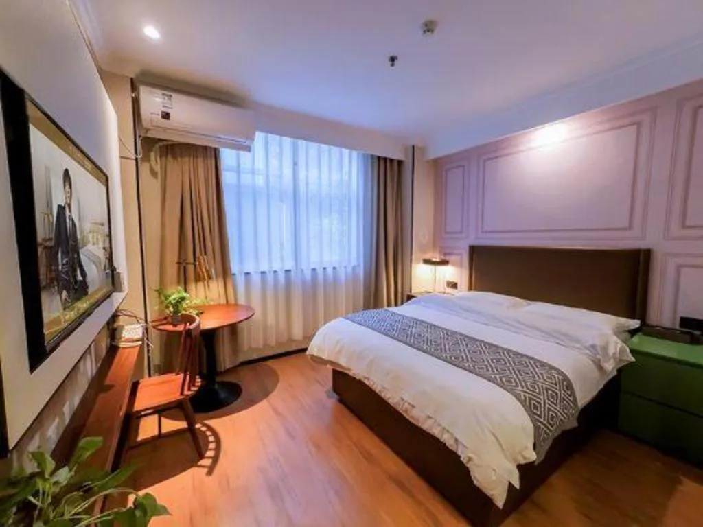 Bed in GME NanJing CaoChanGMEn Nanyihou Stress Hotel
