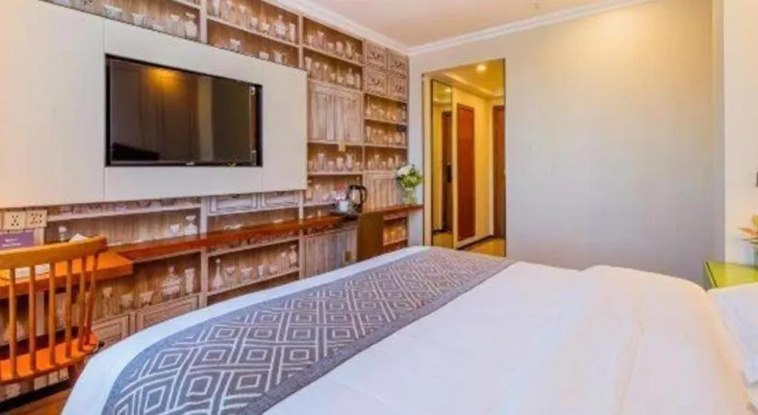 Bed in GME NanJing CaoChanGMEn Nanyihou Stress Hotel