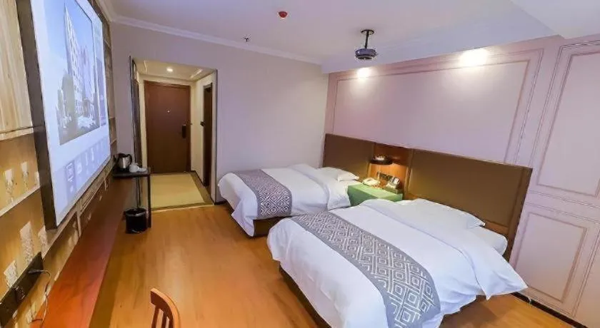 Bed in GME NanJing CaoChanGMEn Nanyihou Stress Hotel