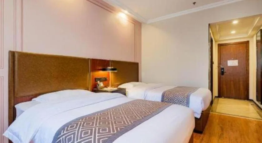 Bed in GME NanJing CaoChanGMEn Nanyihou Stress Hotel