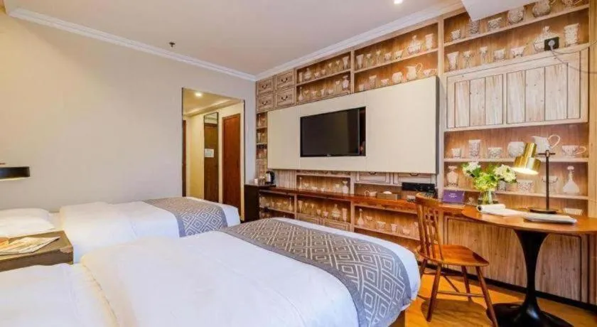 Bed in GME NanJing CaoChanGMEn Nanyihou Stress Hotel