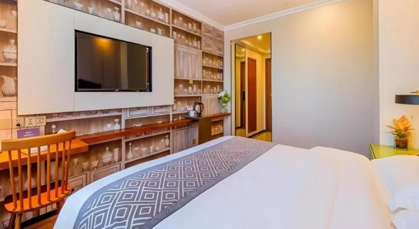 Bed in GME NanJing CaoChanGMEn Nanyihou Stress Hotel