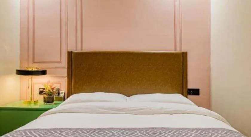 Bed in GME NanJing CaoChanGMEn Nanyihou Stress Hotel
