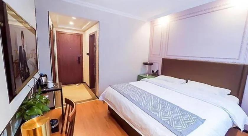 Bed in GME NanJing CaoChanGMEn Nanyihou Stress Hotel