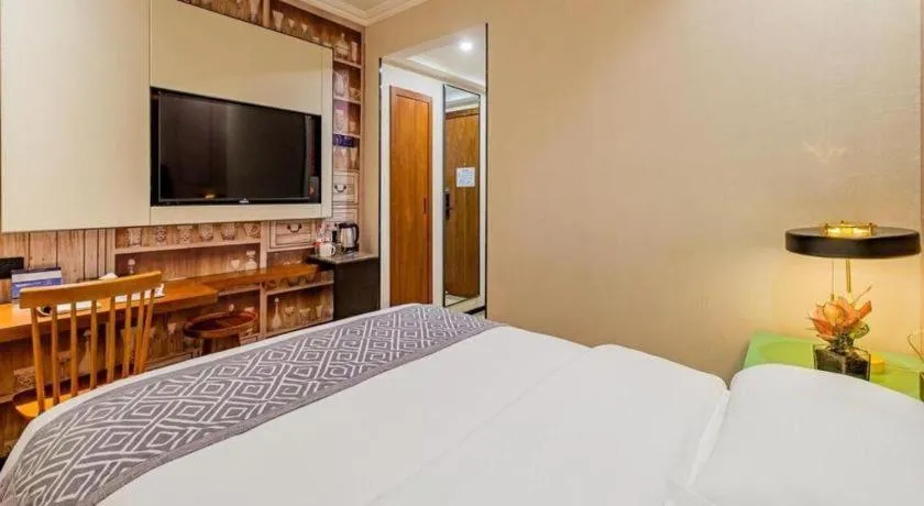 Bed in GME NanJing CaoChanGMEn Nanyihou Stress Hotel