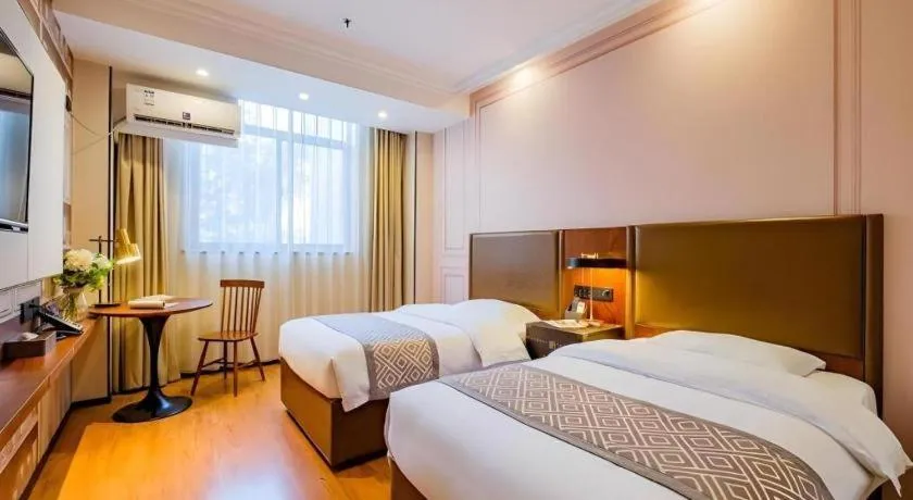 Bed in GME NanJing CaoChanGMEn Nanyihou Stress Hotel