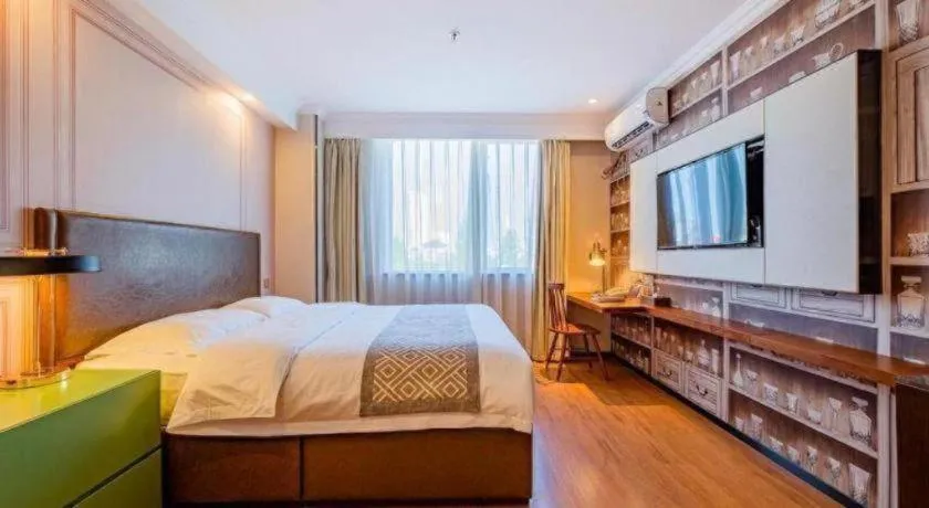 Bed in GME NanJing CaoChanGMEn Nanyihou Stress Hotel