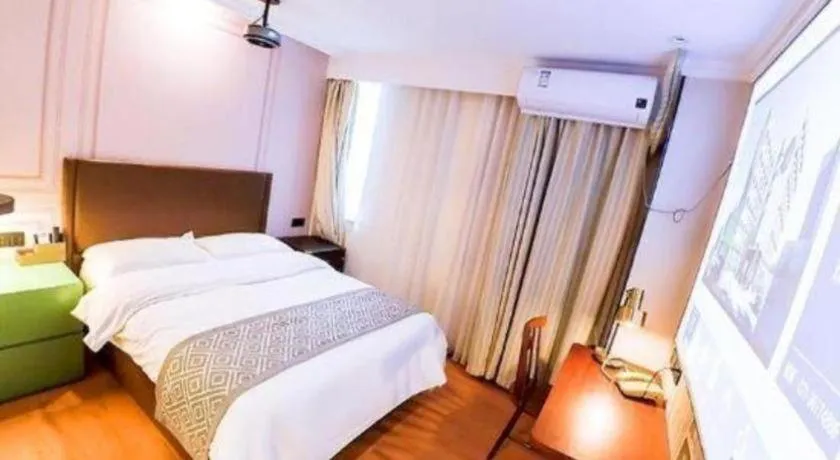 Bed in GME NanJing CaoChanGMEn Nanyihou Stress Hotel