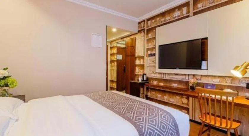 Bed in GME NanJing CaoChanGMEn Nanyihou Stress Hotel