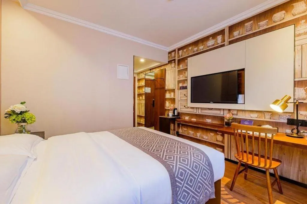 Bed in GME NanJing CaoChanGMEn Nanyihou Stress Hotel