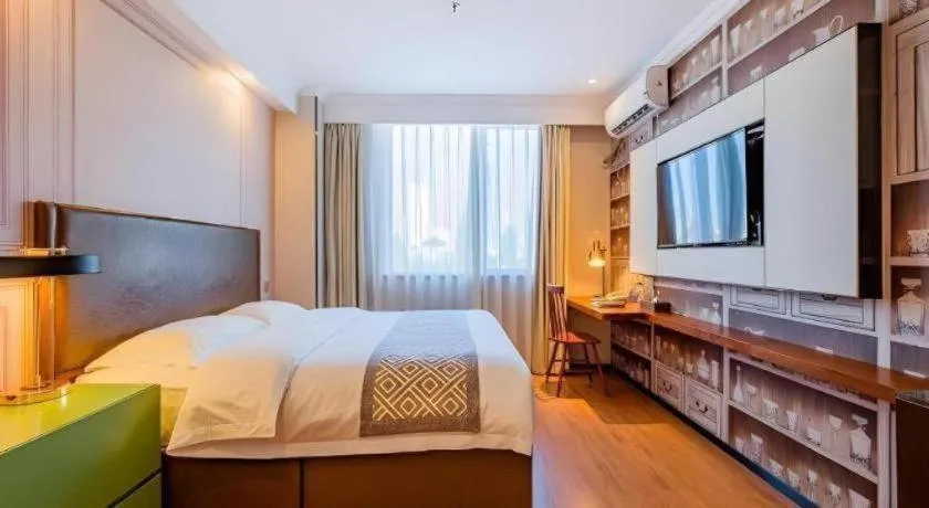 Bed in GME NanJing CaoChanGMEn Nanyihou Stress Hotel