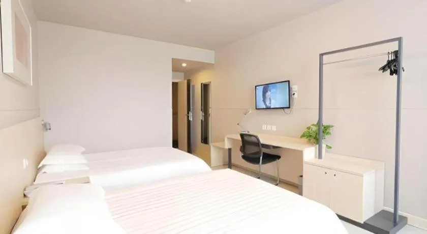 Bed in Jinjiang Inn Shanghai Minhang Zhuanqiao