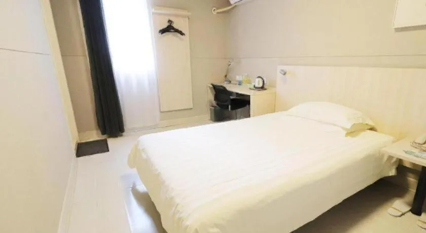 Bed in Jinjiang Inn Shanghai Minhang Zhuanqiao