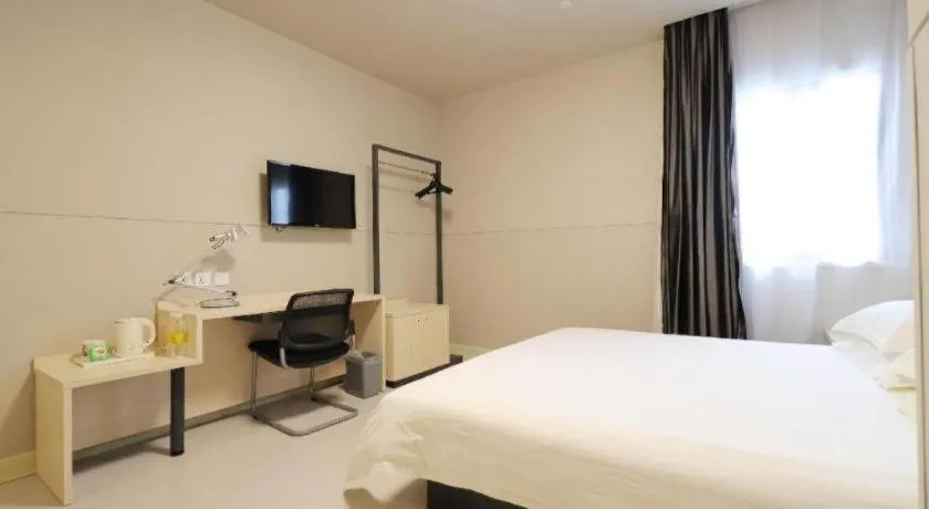 Bed in Jinjiang Inn Shanghai Minhang Zhuanqiao