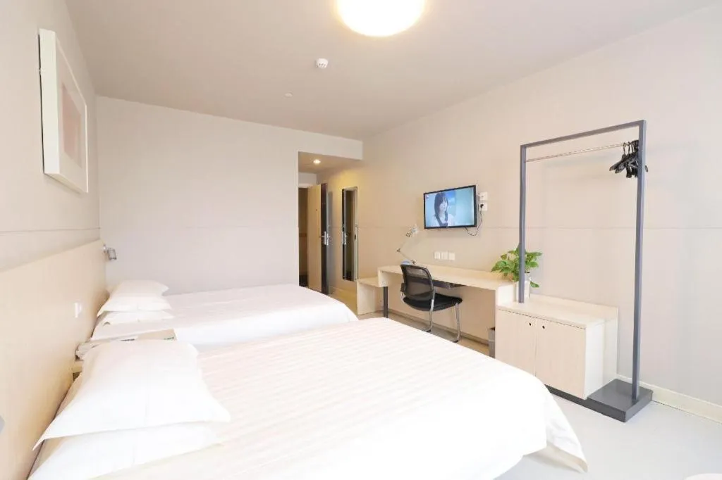 Bed in Jinjiang Inn Shanghai Minhang Zhuanqiao