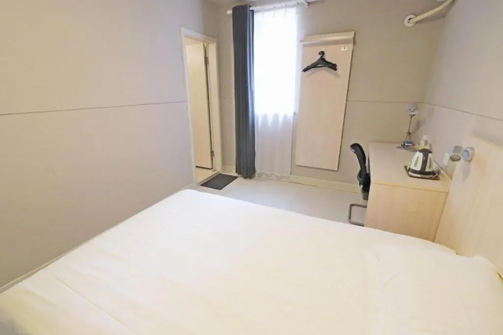 Bed in Jinjiang Inn Shanghai Minhang Zhuanqiao