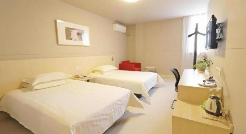 Bed in Jinjiang Inn Shanghai Minhang Zhuanqiao