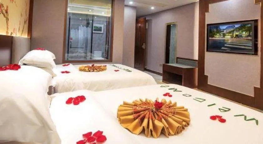 Bed in Nan Guo Hotel