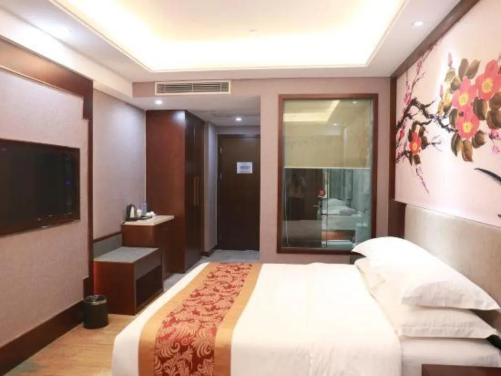 Bed in Nan Guo Hotel