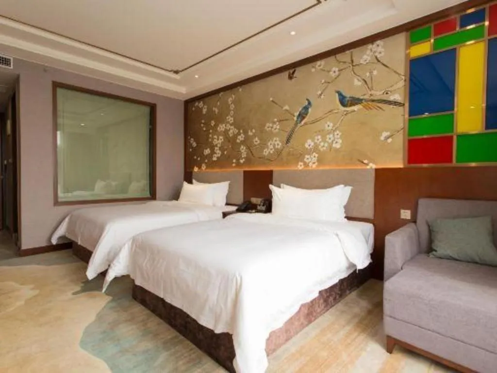 Bed in Nan Guo Hotel