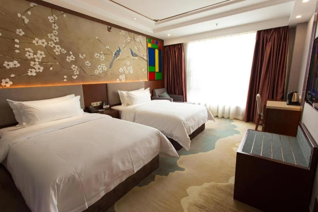 Bed in Nan Guo Hotel