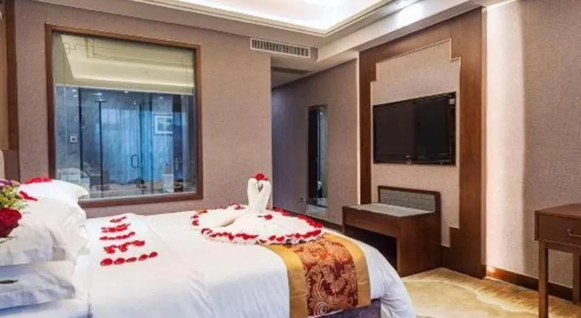 Bed in Nan Guo Hotel