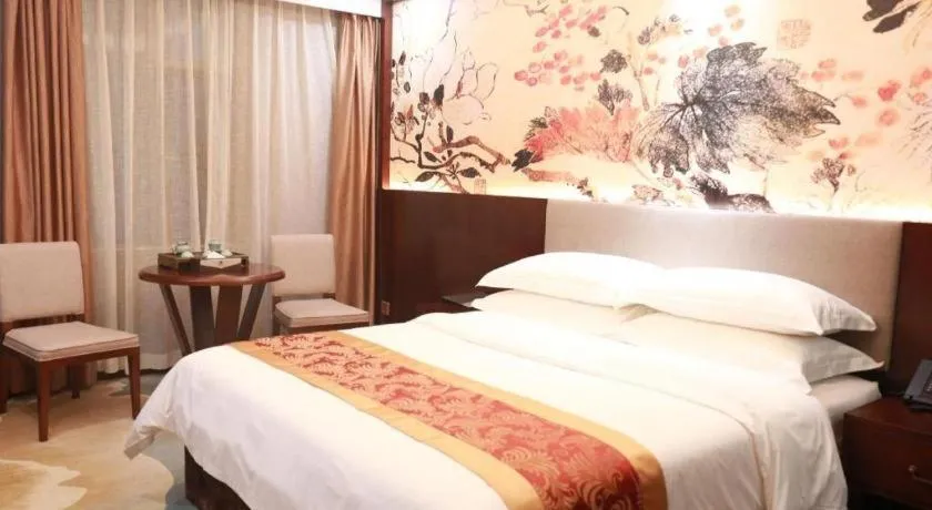 Bed in Nan Guo Hotel