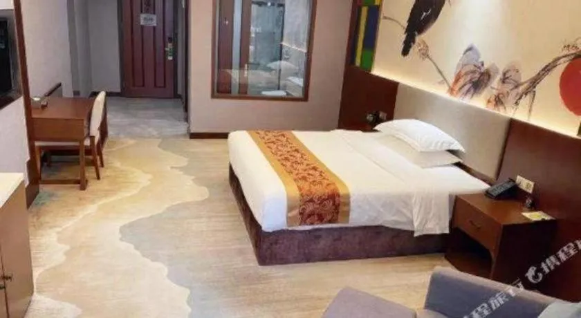 Bed in Nan Guo Hotel