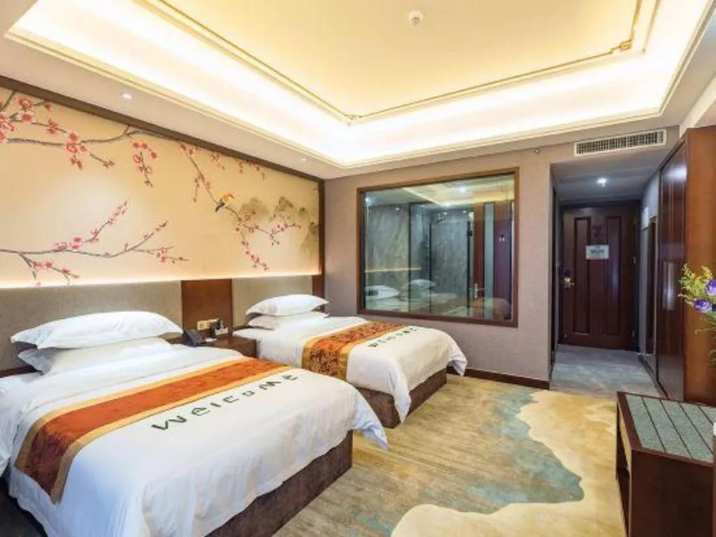 Bed in Nan Guo Hotel