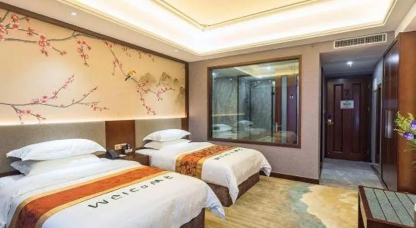 Bed in Nan Guo Hotel