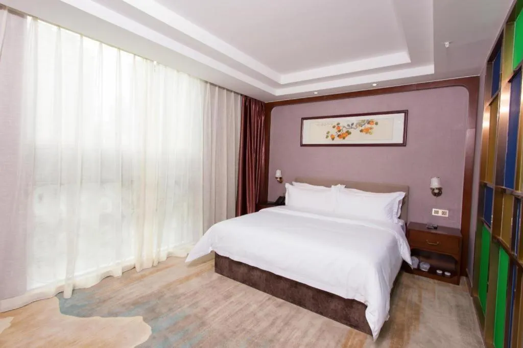 Bed in Nan Guo Hotel