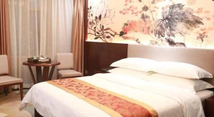 Bed in Nan Guo Hotel