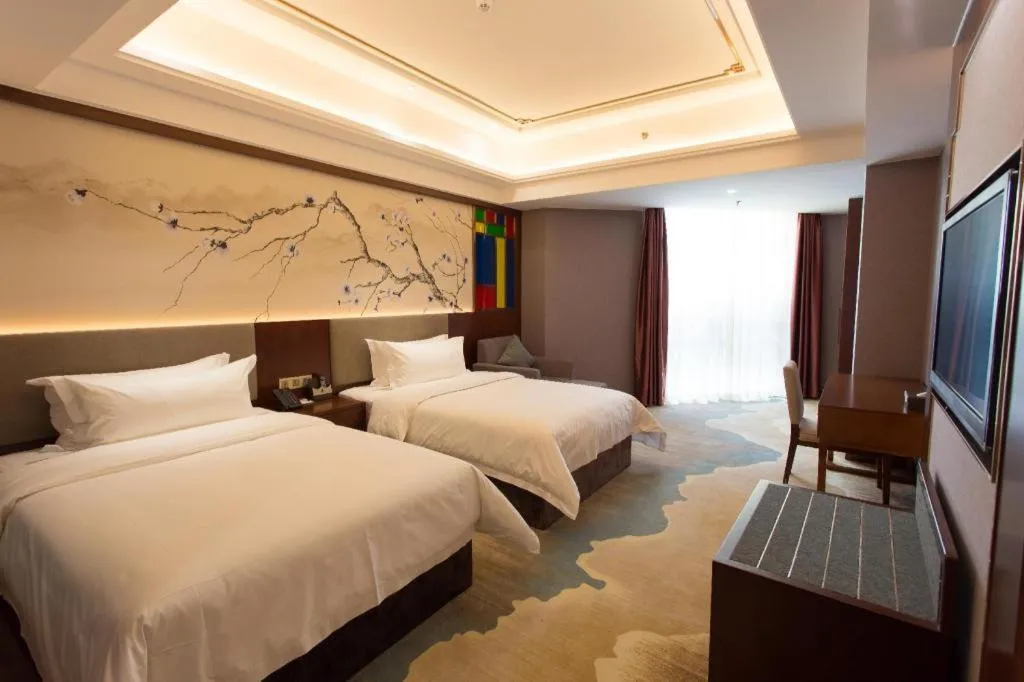 Bed in Nan Guo Hotel