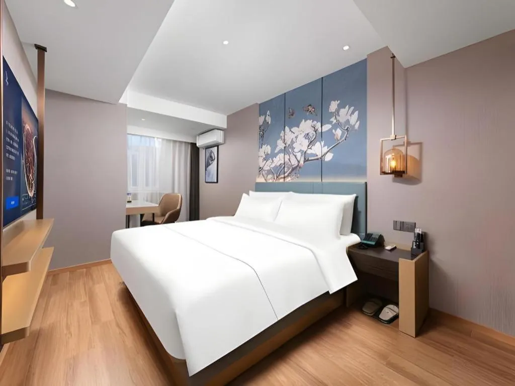 Bed in Magnotel Classic Shenyang General Hospital of Northern Theater Command