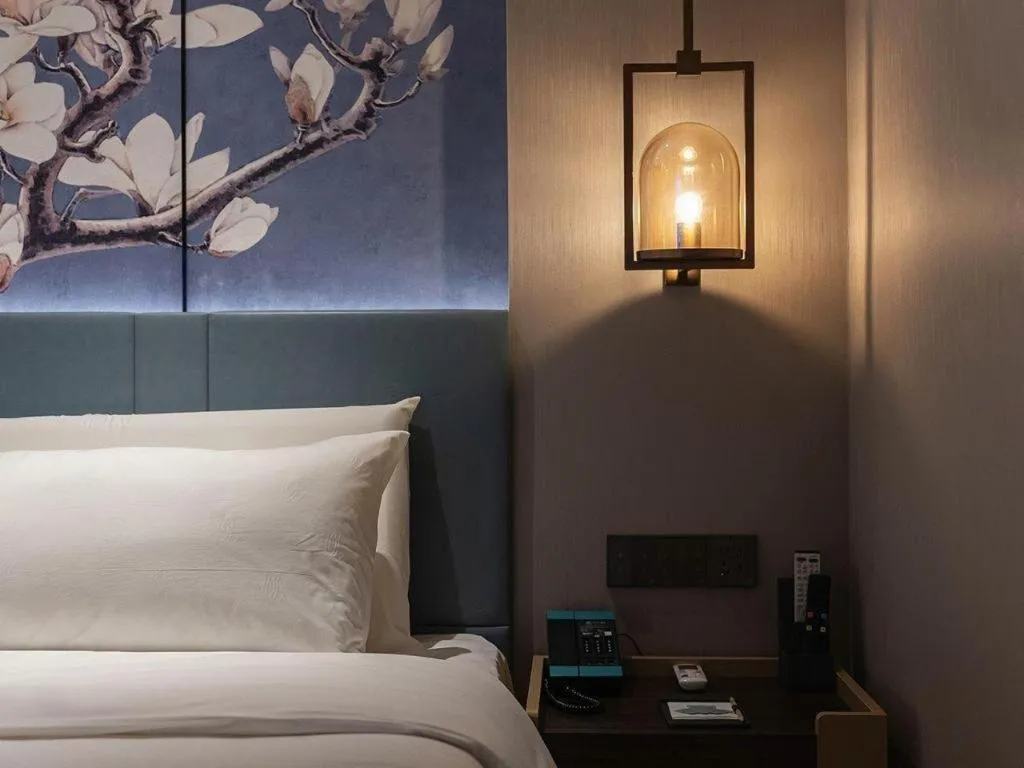 Bed in Magnotel Classic Shenyang General Hospital of Northern Theater Command